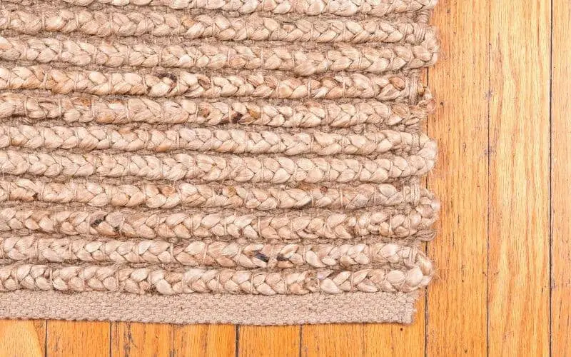 jute rug on wood floor