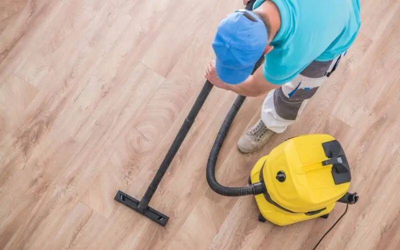 vacuuming wood floor