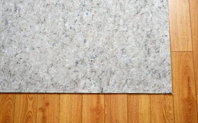 do rug pads damage hardwood floors