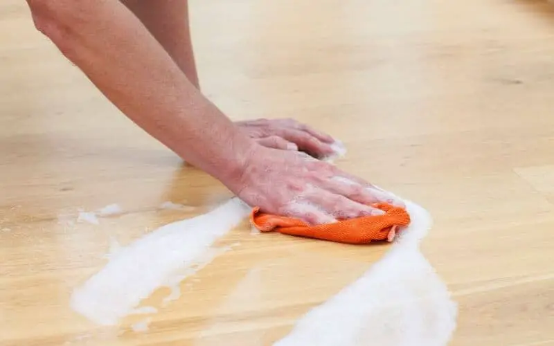 how to remove paint from wood floor without damaging finish