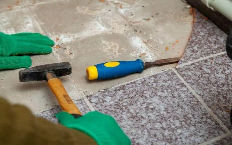 how to remove porcelain tile from concrete floor