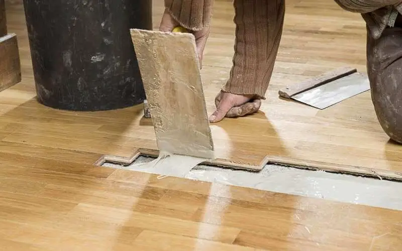 how to fix hollow spots in hardwood floors