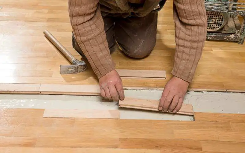 fixing hump in hardwood floor